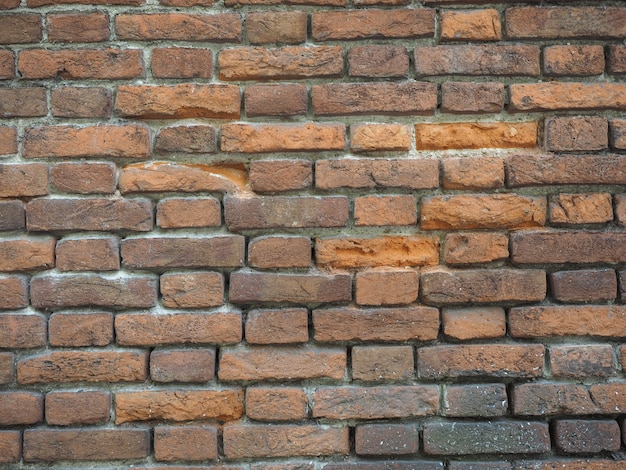 Fond de mur de brique rouge