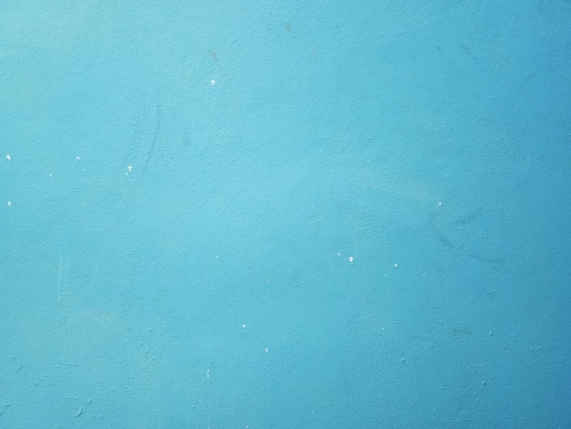 Fond de mur de ciment bleu surface lisse