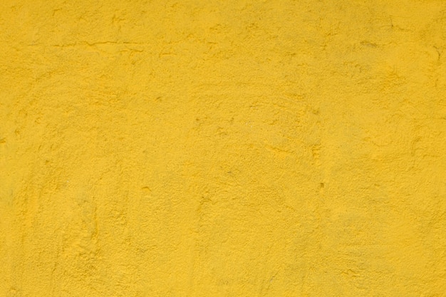 Photo fond de mur de ciment jaune