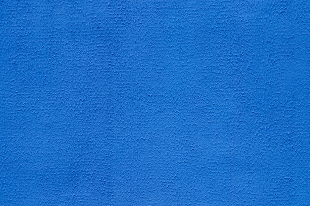 Fond de mur de peinture bleue grain