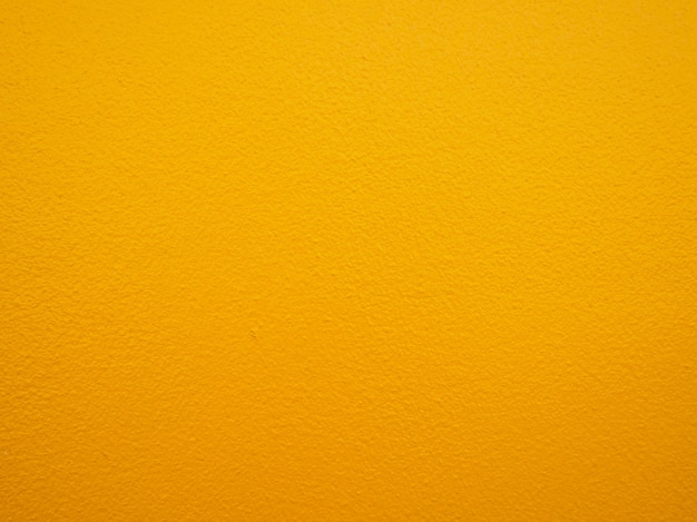 Fond de mur de peinture jaune