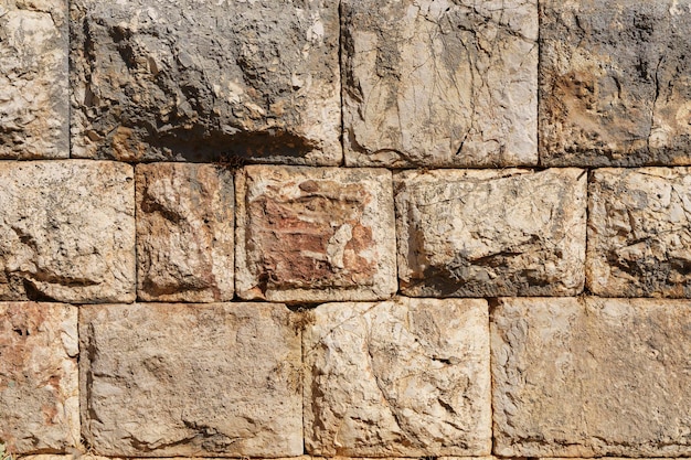 Fond de mur en pierre ancienne Vieux matériau de maçonnerie de texture de l'ancienne maison de construction Concept de ruines d'histoire