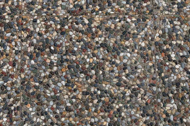 Fond de mur de pierre brun-gris. Modèle de texture et de fond de mur d'ardoise