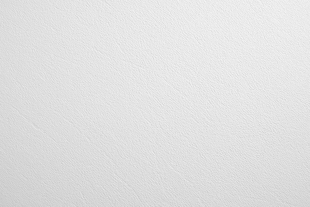 Fond de mur texturé blanc.