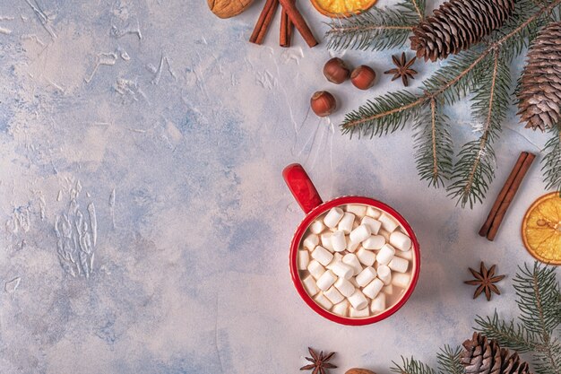 Fond de Noël avec chocolat chaud et guimauve