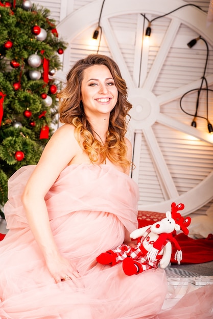 Fond de Noël femme enceinte