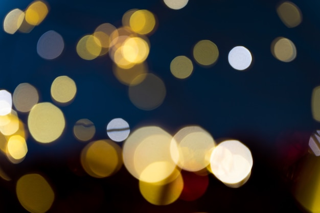 Fond de Noël avec des lumières brillantes de bokeh avec espace de copie pour le texte