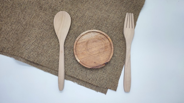 fond de nourriture avec des couverts en bois pour la promotion de produits alimentaires ou la présentation des aliments