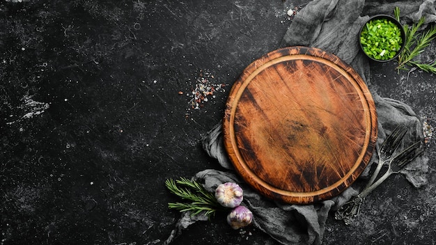 Fond de nourriture Planche de cuisine sur la table avec des épices et des herbes Vue de dessus