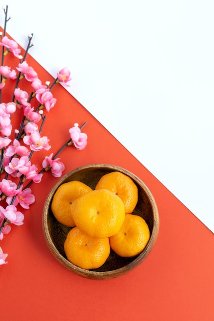 Fond de nouvel an chinois Fleur de cerisier Mandarin Orange fond double ton rouge et blanc