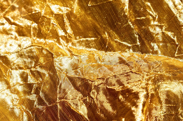 Fond d'or avec texture de tissu