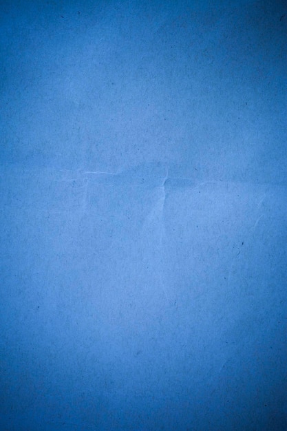 Fond de papier recyclé bleu.