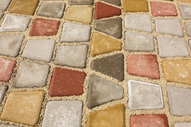 Fond de pavés colorés à la ville. Photo en gros plan