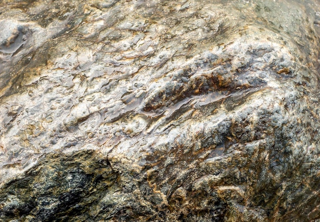 Fond de pierre volcanique fond de papier peint de surface rocheuse avec texture rugueuse