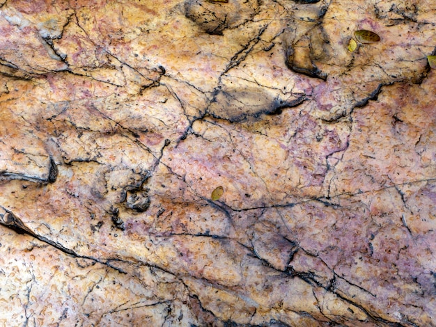 Fond de pierre volcanique, surface rocheuse, fond de papier peint à texture rugueuse