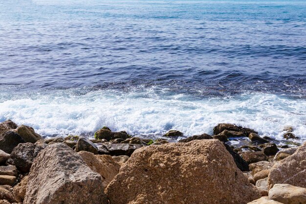 Fond de pierres de mer et de la mer pour le design.