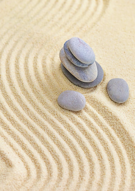 Fond avec des pierres sur le sable Mise au point sélective