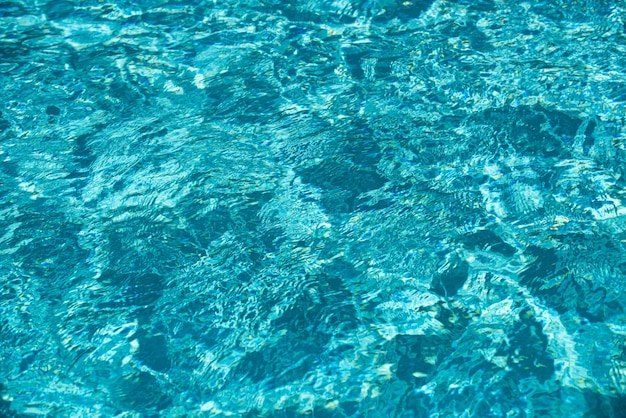 Fond de piscine bleue de surface de l'eau