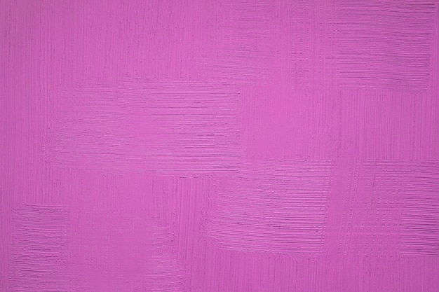 Fond de plâtre violet saturéMur de stuc coloré rose