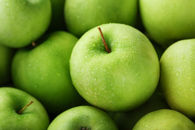 Fond de pommes vertes mûres et juteuses