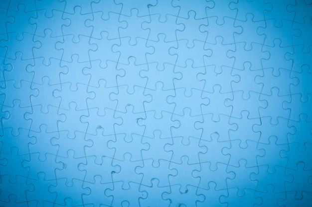 Fond de puzzle bleu.