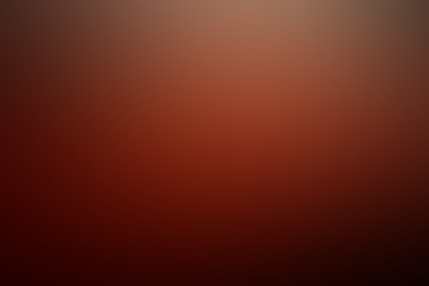 Fond rouge foncé abstrait flou doux, image dégradée de défocalisation