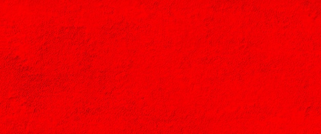 un fond rouge avec une texture rugueuse du texte