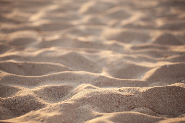 Fond de sable et coucher de soleil. texturé