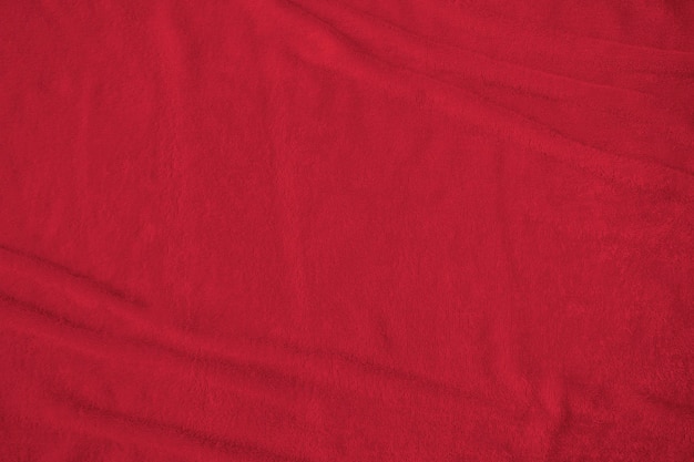 Fond de soie de velours rouge d'une nuance sombre avec un tissu de tissu de satin velouté doux et moelleux de couleur métallique