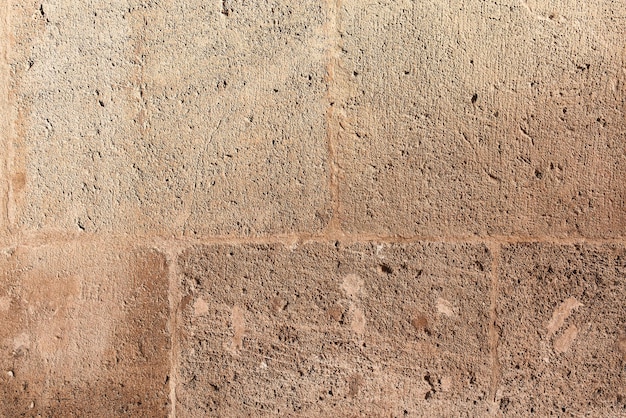 Fond de surface de mur de brique en pierre