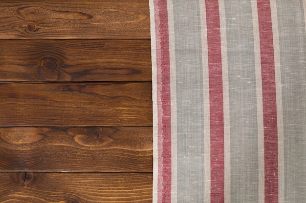 Fond avec table en bois vide avec nappe