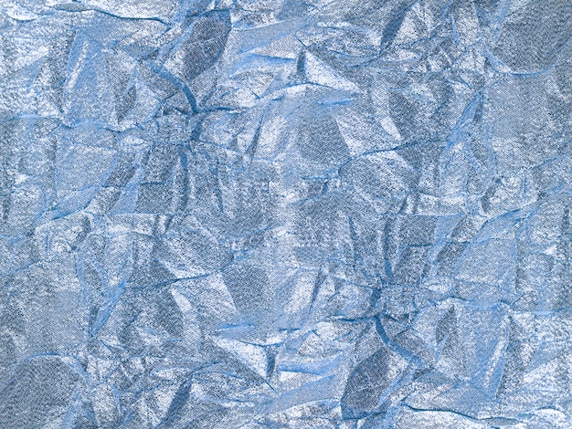 Fond textile bleu argent brillant