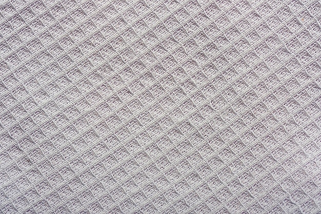 Fond textile d'une nappe texturée grise bouchent