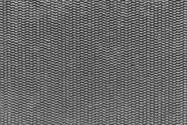 fond texturé abstrait de couleur grise de matériau polymère ou de tissu synthétique
