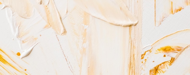Fond de texture abstraite artistique coup de pinceau de peinture acrylique dorée éclaboussure d'huile d'encre texturée comme toile de fond d'impression pour la conception de bannière flatlay de marque de vacances de luxe