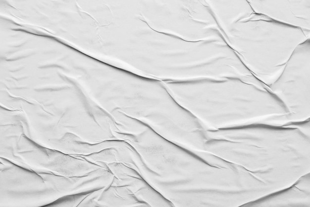 Fond de texture d'affiche de papier blanc froissé et froissé