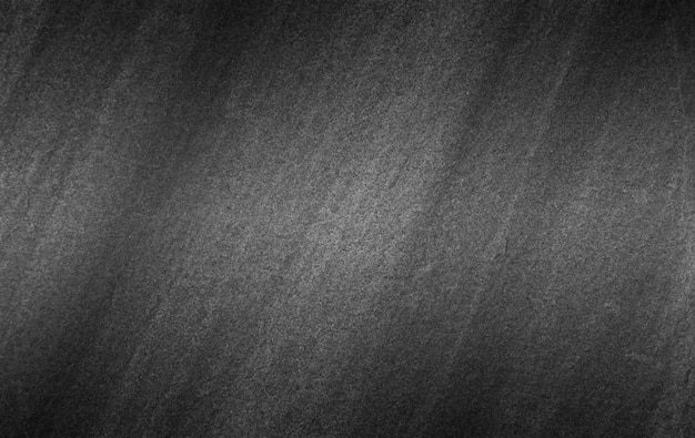 Fond ou texture d&#39;ardoise noire gris foncé.