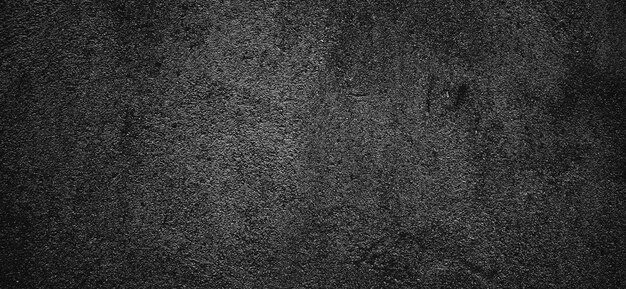 Fond de texture béton pierre noire ciment noir gris foncé pour le fond