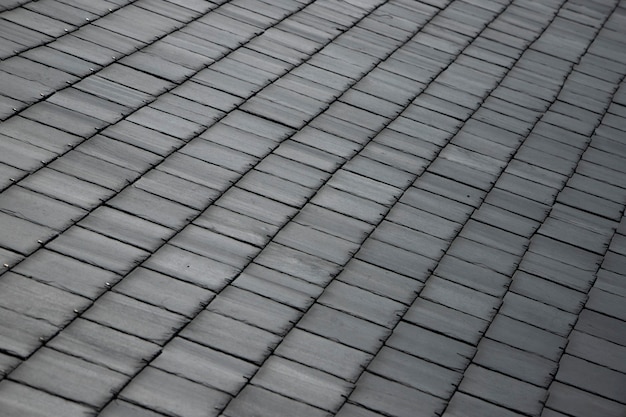 Fond texturé de carreaux carrés gris