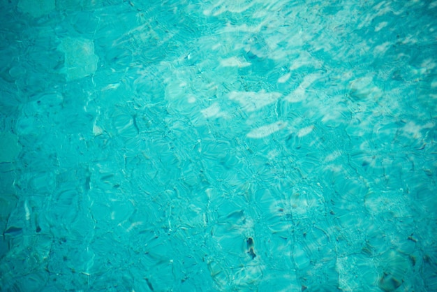 Fond de texture caustique sans soudure de piscine d'eau