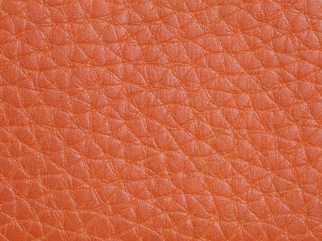 Fond de texture de cuir de bétail orange véritable. Photo macro