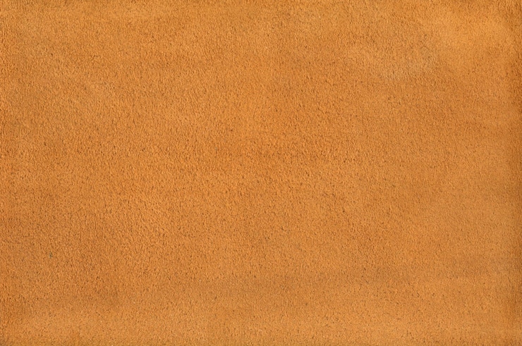 Photo fond de texture en cuir suédé orange