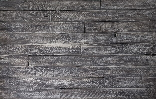 fond et texture du mur de grange en bois noir décoratif