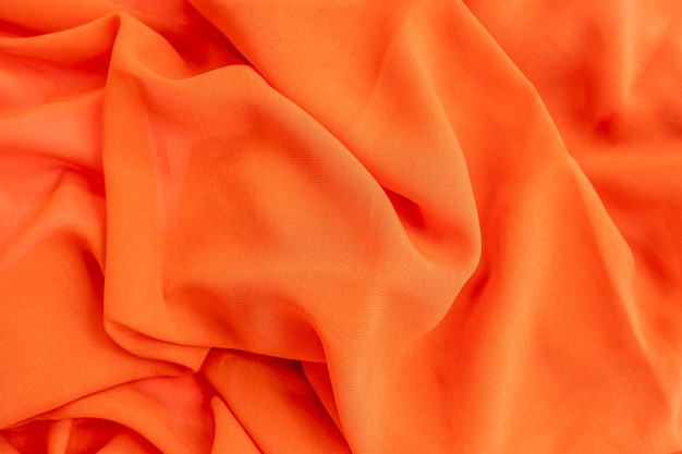 Fond de texture écharpe orange, idée de concept minimale.