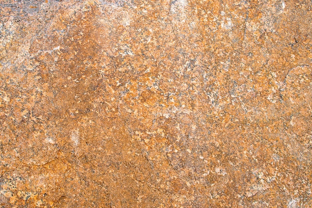 Fond de texture de granit brun doré jaune brut brut fond de texture de pierre de roche naturelle