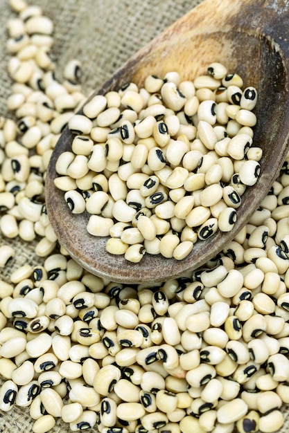 Fond de texture de haricots aux yeux noirs. Haricots de niébé. Légumineuses séchées.