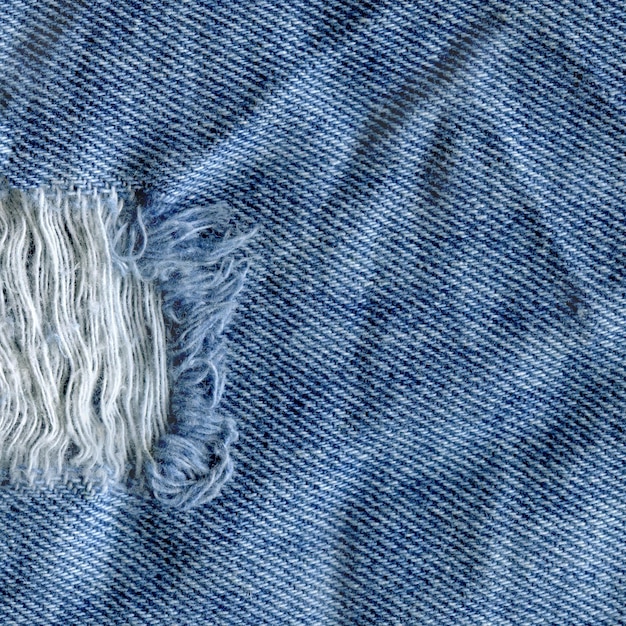 Fond de texture de jean denim bleu Texture de tissu déchiré Jeans