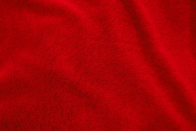 Fond de texture de laine propre rouge laine de mouton naturelle légère texture de coton rouge sans couture de fourrure moelleuse pour les concepteurs gros plan fragment tapis de laine rouge