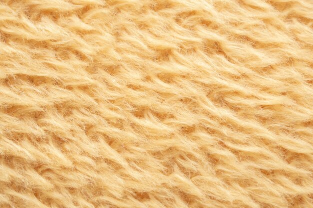 Fond de texture de laine de tissu de fourrure moelleux jaune