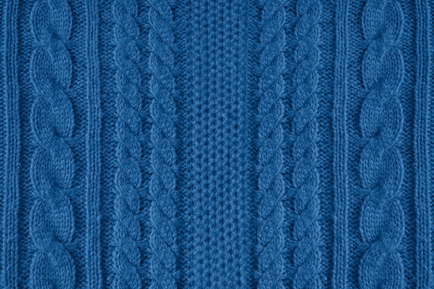 Fond de texture de laine tricotée bleue